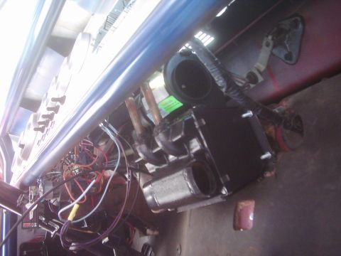 1978 Ford Bronco - Aftermarket heater unit installed in a 1978 Ford Bronco, showing complex wiring and dashboard components.
