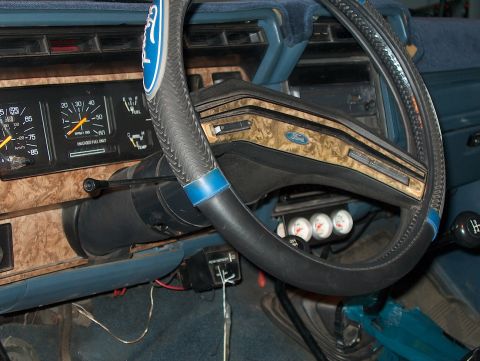 1986 Ford Bronco - Dashboard interior of a Ford truck or Bronco, showing gauges and steering wheel.