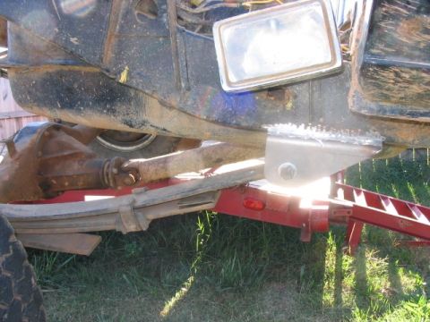 1986 Ford F-150 - Custom bracket welded to truck frame near leaf spring and differential.