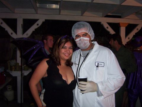 2000 Ford F-450 - Two people in costumes pose for a photo at an outdoor party event.