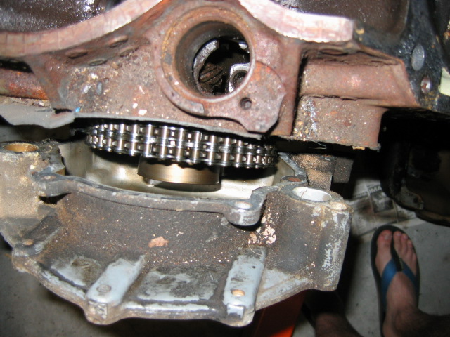 The timing chain cover came off, but the harmonic balancer needs to be pulled before that will come off.