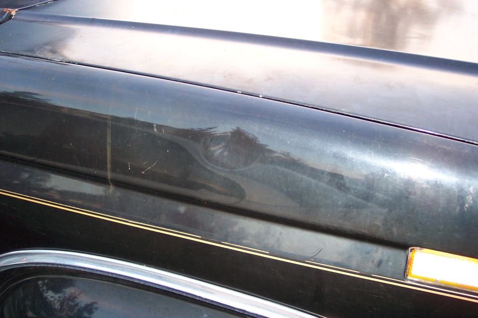 Passanger fender dent