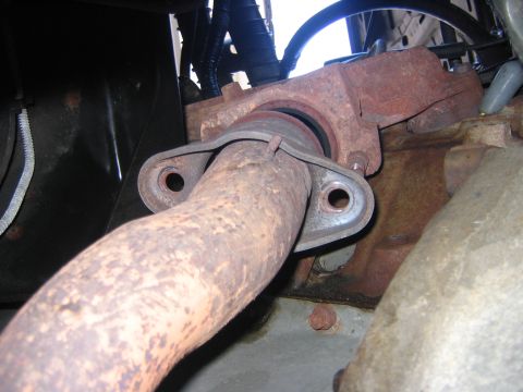 1995 Ford Bronco - The, with lots of heat I removed t he nuts holding the crossover pipes on the exhaust manifolds.