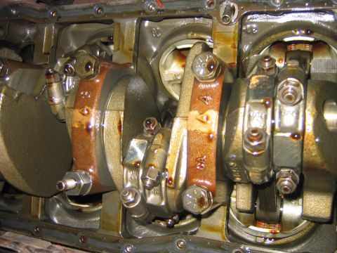 1995 Ford Bronco - With the pan off you can inspect the bottom end of the motor, everything looked ship shape to me. You can see where the oil pick-up attache…