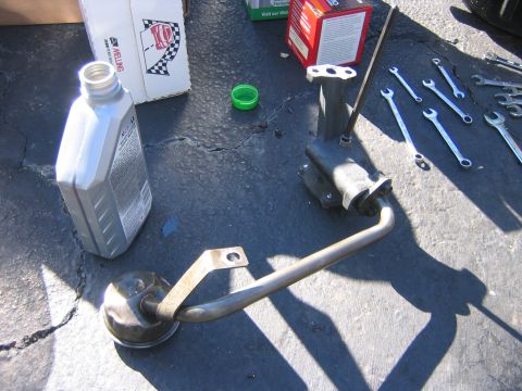 1995 Ford Bronco - Bolted the pick-up to the new pump, the little rod sticking out of the pump is the drive shaft for it, which runs off the distributor. If t…