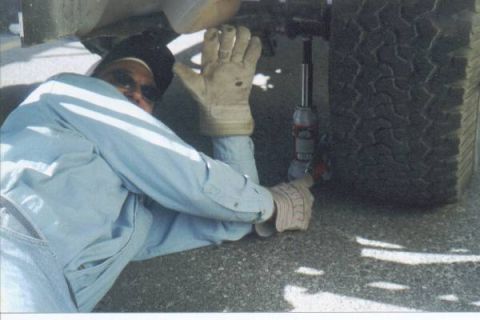 1990 Ford Bronco - get used to it...this is how you will eventually see me...changing a tire