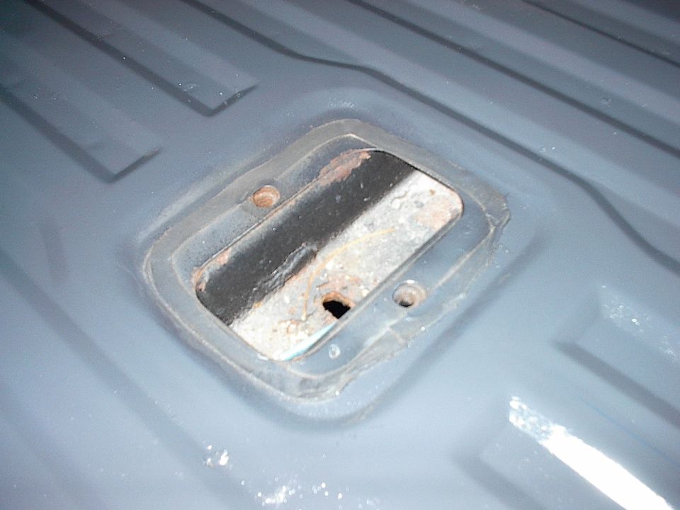Wish I could find this rubberized tape that surrounds the rear seat anchor plate so I could stick it between the taligate and tailgate access cover.