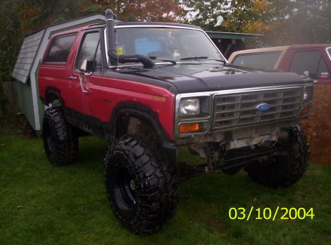 1983 Ford Bronco - This lifted 1983 Ford Bronco features a snorkel and aggressive off-road tires, ready for any adventure.