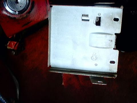 1979 Ford Bronco - This image shows a close-up of a vehicle's interior door latch mechanism, not the exterior of a 1979 Ford Bronco.