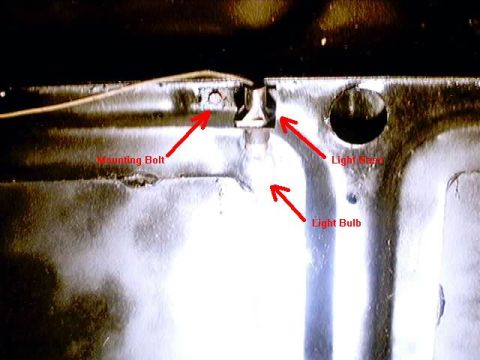 1979 Ford Bronco - Interior light assembly components are labeled in this close-up view.