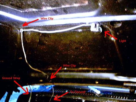 1979 Ford Bronco - Close-up view of wiring and components in a vehicle's engine bay, with labels pointing out specific parts.