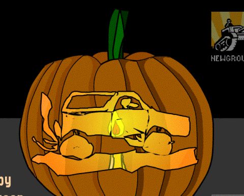 1992 Ford Bronco - A carved pumpkin displays a truck silhouette against a dark background.
