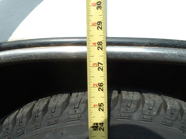 Height with Explorer Sport 4wd springs installed; from ground to lip of fender.