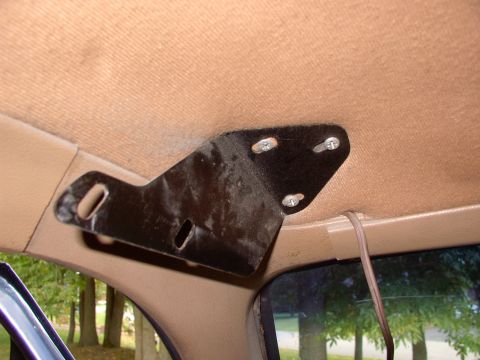 1986 Ford Bronco - These brackets screw right into the existing sun visor holes and allow you to bolt the shelf to them.