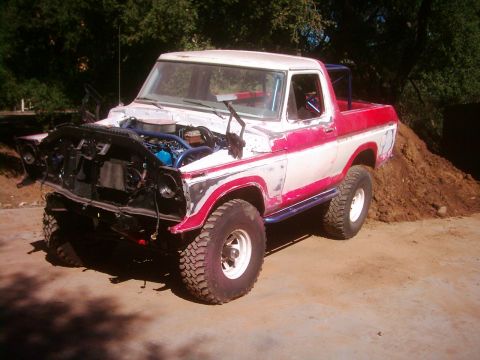 1978 Ford Bronco - This 1978 Ford Bronco is undergoing some work, with its front end disassembled and the engine exposed.