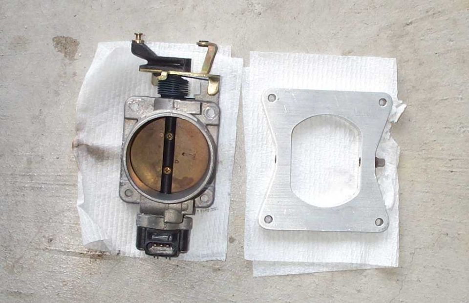 My "new" 70mm FRPP throttlebody and intake spacer.