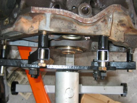 1992 Ford Bronco - This is the proper way to shim the block on the engine stand. The block is now tightly pulled up to the stand.