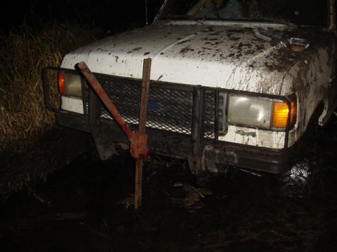 1989 Ford Bronco - This 1987 Ford Bronco is stuck in the mud, requiring a Hi-Lift jack for extraction.