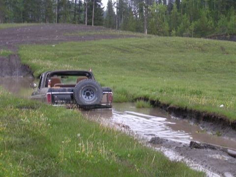 1979 Ford Bronco - this is another, stuck deep, this hole cost me my cd changer & a boom tube, the water/mud level was almost to the top of my seats!