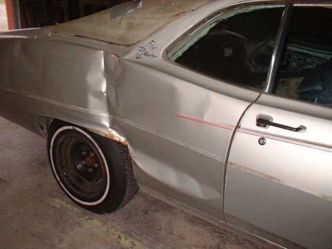1971 Ford Torino - This 1971 Ford Torino has extensive damage to the rear quarter panel.