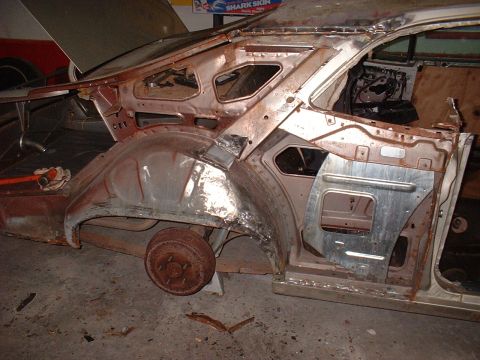 1971 Ford Torino - This vehicle is undergoing extensive bodywork, with much of its interior and exterior panels removed.