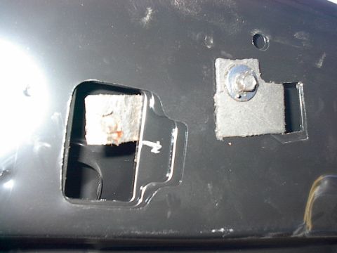 1986 Ford Bronco - Removed old hood latch tension strap from old hood and reinstalled it on new hood. DO NOT do this until you are absolutely satisfied with t…