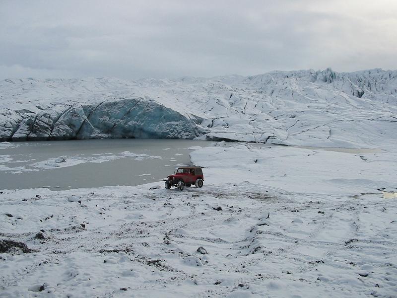 Jeep playing next to the glacier.