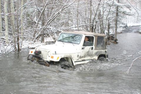 1985 Ford Bronco - Bill coming out. and complaining that he forgot to put his floor plugs back in.