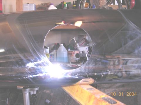 2004 Ford F-250 - I strted by removing the bumper, and decideing where i wanted to mount the light. Once the pattern was traced, i used a jig saw with a meta…