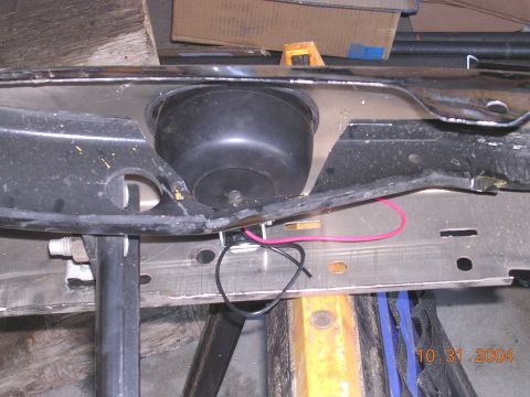 2004 Ford F-250 - Close-up of a vehicle frame section with visible wiring and a date stamp of October 31, 2004.