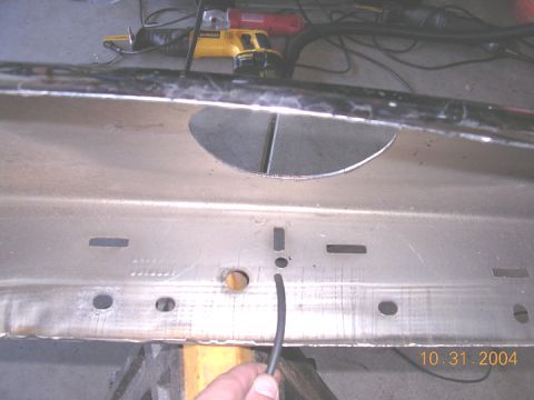 2004 Ford F-250 - the black line is showing where on the bumper i drilled the mounting hole for the lihts. i then drilled a corresponding hole in the plastic…