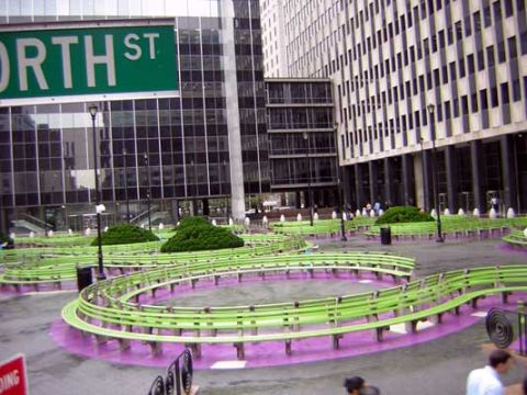 1995 Ford Bronco - A street sign for North Street is visible above a park area curved green benches.