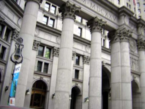 1995 Ford Bronco - A grand building entrance with classical architectural elements, including large columns and ornate detailing.