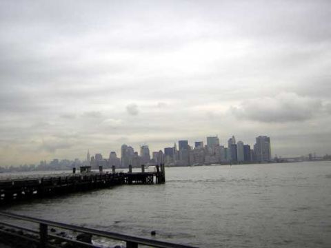 1995 Ford Bronco - A view of the New York City skyline from the water, with a pier extending into the frame.