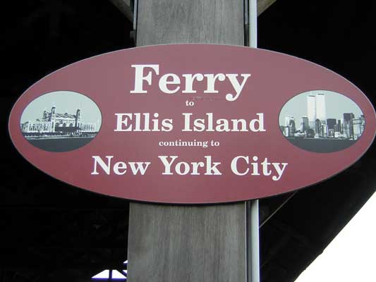 Ferry to Ellis Island continuing to New York City sign with images of buildings