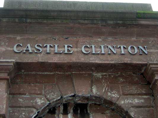 Castle Clinton sign on a stone building facade