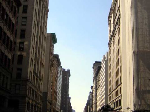 1995 Ford Bronco - Tall buildings create a canyon effect on a clear day in New York City.