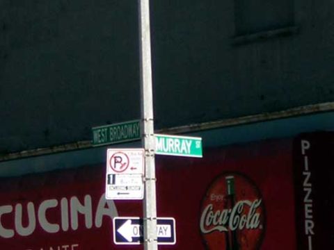 1995 Ford Bronco - Street signs indicate West Broadway and Murray Street, with commercial signage visible on a building below.