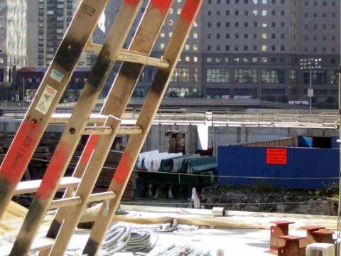 1995 Ford Bronco - Construction site scene with a ladder in the foreground and buildings in the background.