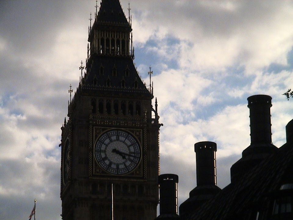 Big Ben clock tower in London against a cloudy sky