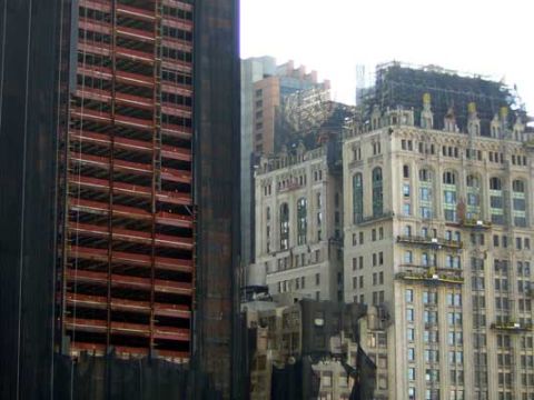 1995 Ford Bronco - Urban landscape shows buildings in various stages of construction and renovation.