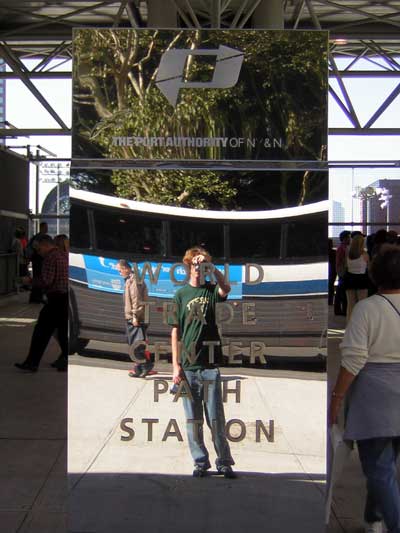1995 Ford Bronco - A person stands in front of a reflective pillar at the World Trade Center PATH Station.