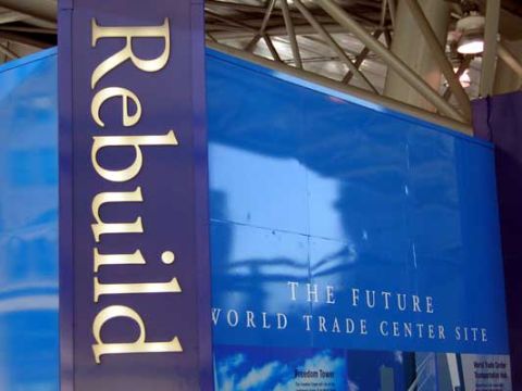 1995 Ford Bronco - Exhibit signage about rebuilding the World Trade Center site, with 'Rebuild' prominently displayed.