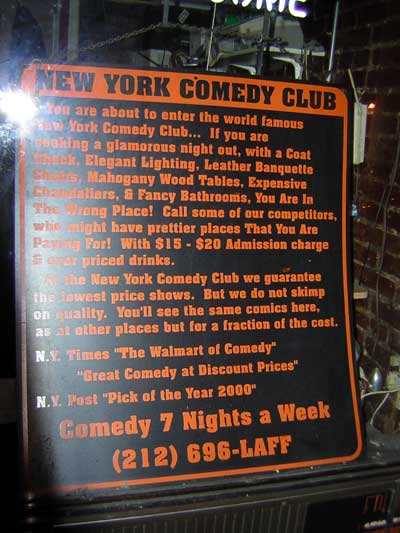 1995 Ford Bronco - Sign for the New York Comedy Club advertises shows and provides a phone number for reservations.