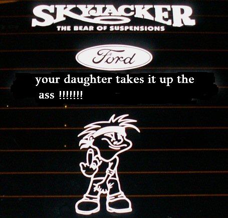 1993 Ford Bronco - This image shows decals on a dark surface, including 'Skyjacker', 'Ford', and a cartoon figure.