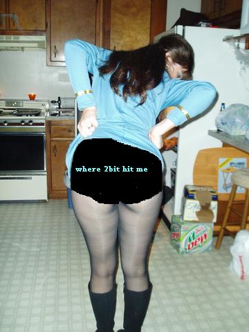 1993 Ford Bronco - A person stands in a kitchen, with text overlaid on their shorts.