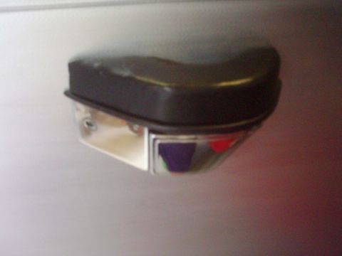 1978 Ford Bronco - Close-up of a vehicle door handle and lock mechanism.