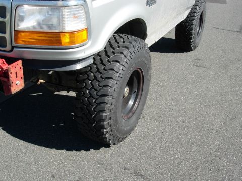 1995 Ford Bronco - New in Nov.'04. Wanted Swamper SSR's, but the wallet could only swing these. I'm sure I'll get over it.