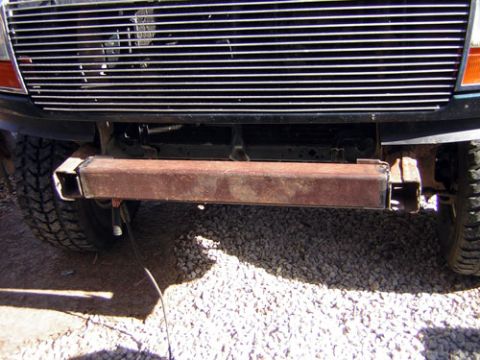 1995 Ford Bronco - Close-up of a vehicle's front end, showing a custom bumper and grille.