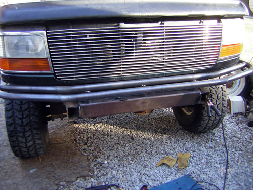 1995 Ford Bronco front end with custom tubular bumper installed over stock bumper